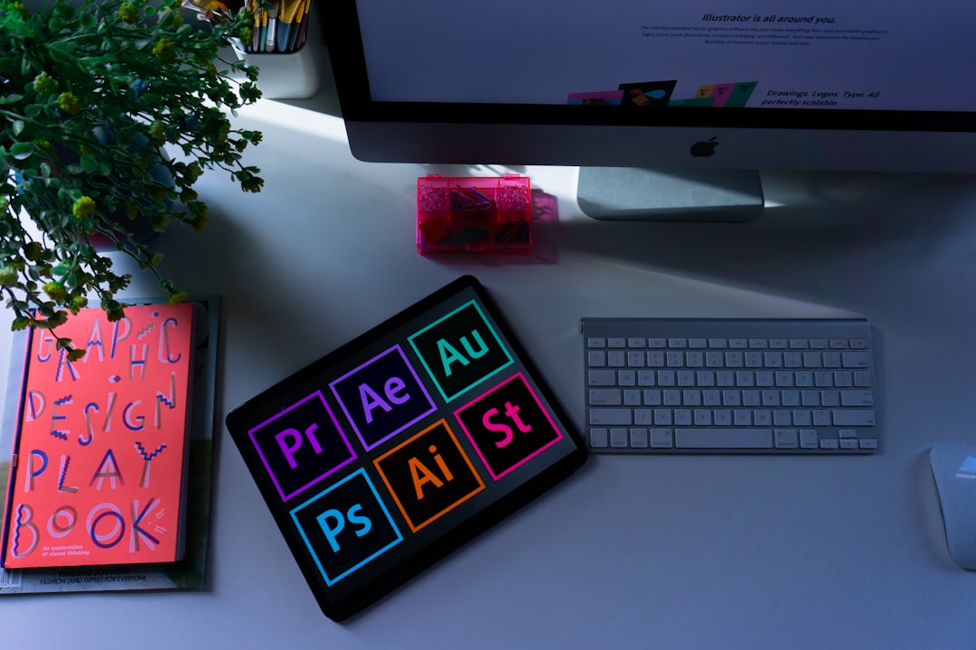 Photo by Emily Bernal silver imac and apple keyboard
