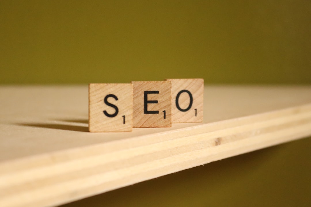 Photo by NisonCo PR and SEO a wooden block that says seo on it